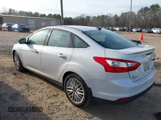 2013 Ford Focus Titanium with VIN 1FADP3J22DL167324, listed as a IAAI auction lot 41616927 with 127,259 mi miles and . Bid and sale history available at carsss.com. Image 3.