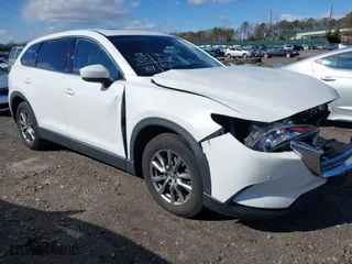 2019 Mazda CX-9 Touring with VIN JM3TCBCYXK0332409, listed as a IAAI auction lot 41567494 with 58,395 mi miles. Bid and sale history available at carsss.com. Image 1.