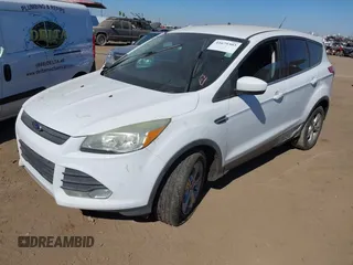2015 Ford Escape SE with VIN 1FMCU0G7XFUA52818, listed as a IAAI auction lot 41679303 with 127,098 mi miles. Bid and sale history available at carsss.com. Image 2.