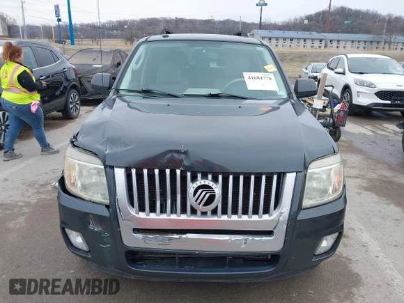 2010 Mercury Mariner z VIN 4M2CN8B75AKJ21050, wystawiony jako IAAI lot #41684770 z przebiegiem 149 028 mil mil oraz . Historia ofert i sprzedaży dostępna na DreamBid. Obrazek 12.