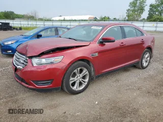 2015 Ford Taurus SEL with VIN 1FAHP2E88FG166961, listed as a Copart auction lot 61429255 with 124,780 mi miles and Salvage title. Bid and sale history available at DreamBid. Image 1.