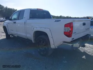 2014 Toyota Tundra 4WD Truck SR with VIN 5TFUW5F1XEX370559, listed as a IAAI auction lot 41587074 with 176,057 mi miles. Bid and sale history available at carsss.com. Image 3.