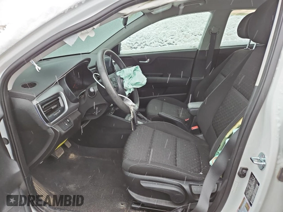 2023 Kia Rio LX with VIN 3KPA24AD0PE566085, listed as a Copart auction lot 50354455 with 65,203 mi miles and Salvage Title. Bid and sale history available at DreamBid. Image 7.