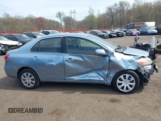 2009 Toyota Yaris with VIN JTDBT903891336792, listed as a IAAI auction lot 42096543 with 115,735 mi miles and . Bid and sale history available at DreamBid. Image 13.