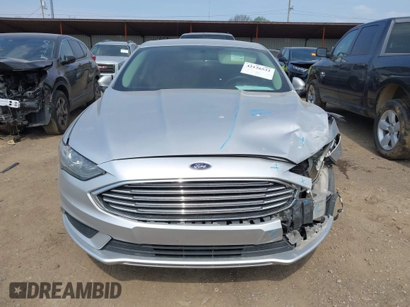 2017 Ford Fusion SE z VIN 3FA6P0HD0HR129175, wystawiony jako IAAI lot #42126532 z przebiegiem 120 424 mil mil oraz . Historia ofert i sprzedaży dostępna na DreamBid. Obrazek 12.