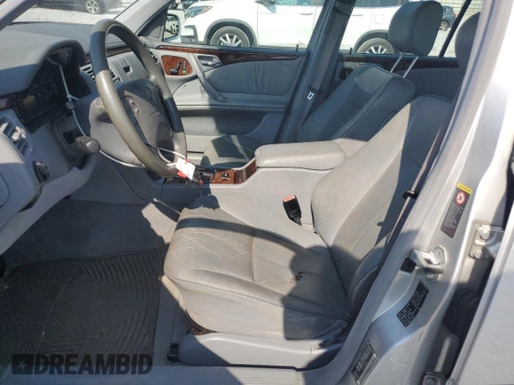 2001 Mercedes-Benz E-Class with VIN WDBJF65J11B272438, listed as a Copart auction lot 69214744 with 194,492 mi miles and Salvage Title. Bid and sale history available at carsss.com. Image 7.