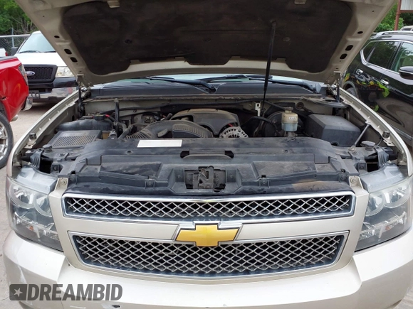 2013 Chevrolet Suburban LT with VIN 1GNSKJE74DR166223, listed as a IAAI auction lot 42172184 with 200,901 mi miles and . Bid and sale history available at DreamBid. Image 10.