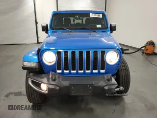2023 Jeep Gladiator Overland z VIN 1C6HJTFG6PL564337, wystawiony jako Copart lot #59620315 z przebiegiem 31 552 mil mil oraz Czysty tytuł • Clean title. Historia ofert i sprzedaży dostępna na DreamBid. Obrazek 5.