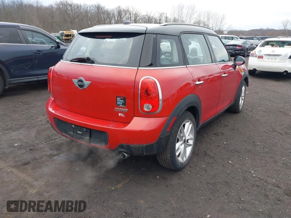2013 MINI Cooper Countryman with VIN WMWZB3C57DWM07565, listed as a IAAI auction lot 41655938 with 62,694 mi miles. Bid and sale history available at carsss.com. Image 4.