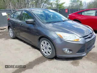 2012 Ford Focus SE z VIN 1FAHP3K23CL366574, wystawiony jako IAAI lot #41991027 z przebiegiem 137 862 mil mil oraz . Historia ofert i sprzedaży dostępna na DreamBid. Obrazek 1.