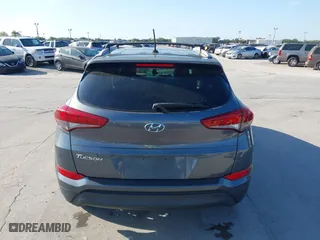 2016 Hyundai Tucson SE with VIN KM8J33A44GU209299, listed as a IAAI auction lot 41793611 with 42,417 mi miles. Bid and sale history available at carsss.com. Image 16.