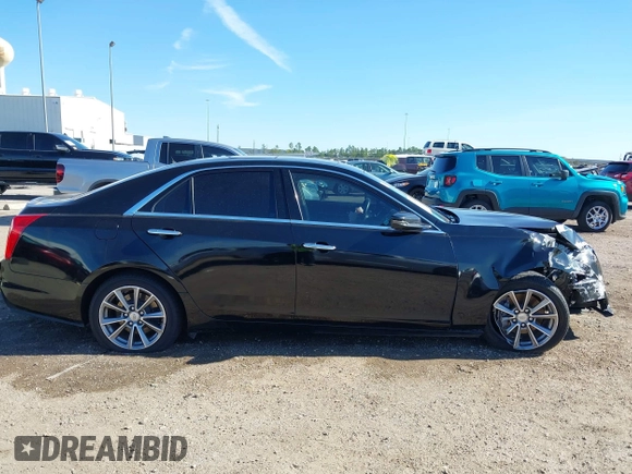2017 Cadillac CTS Luxury RWD with VIN 1G6AR5SS3H0195046, listed as a IAAI auction lot 41081829 with 120,097 mi miles and . Bid and sale history available at DreamBid. Image 13.