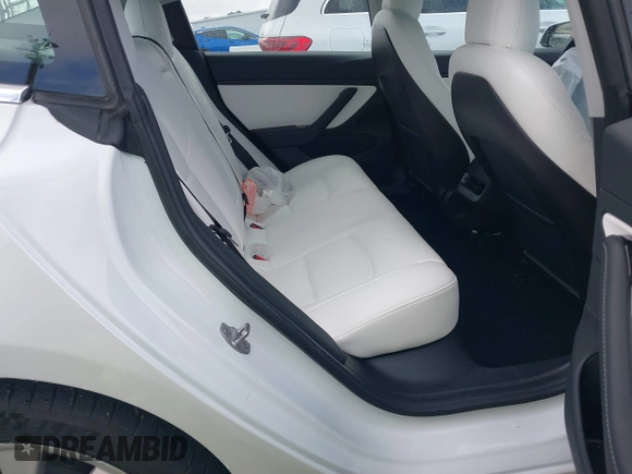2020 Tesla Model 3 Standard Range Plus with VIN 5YJ3E1EA0LF741311, listed as a IAAI auction lot 41581931 with 43,284 mi miles. Bid and sale history available at carsss.com. Image 8.