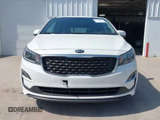 2021 Kia Sedona LX with VIN KNDMB5C12M6661917, listed as a IAAI auction lot 42129682 with 80,321 mi miles and . Bid and sale history available at carsss.com. Image 12.