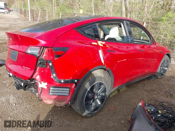 2021 Tesla Model Y Long Range with VIN 5YJYGDEE3MF212845, listed as a IAAI auction lot 41864260 with 43,451 mi miles. Bid and sale history available at carsss.com. Image 4.