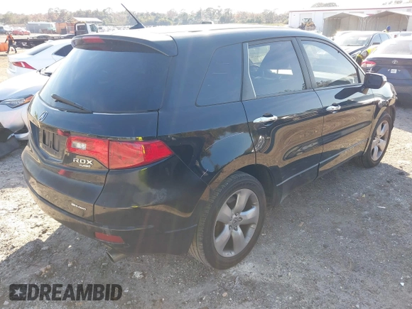 2009 Acura RDX with VIN 5J8TB18249A003141, listed as a IAAI auction lot 41469730 with 180,358 mi miles and . Bid and sale history available at DreamBid. Image 4.