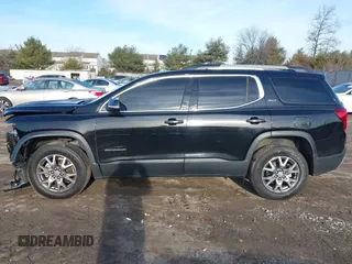 2020 GMC Acadia SLT with VIN 1GKKNMLS8LZ180007, listed as a IAAI auction lot 41197369 with 61,968 mi miles and . Bid and sale history available at DreamBid. Image 14.