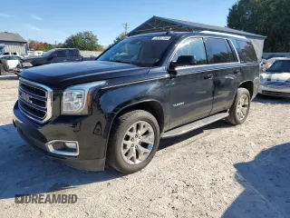 2017 GMC Yukon SLE with VIN 1GKS1AKC5HR221558, listed as a Copart auction lot 82817444 with 166,083 mi miles and Salvage Title. Bid and sale history available at carsss.com. Image 1.