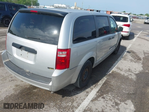 2008 Dodge Grand Caravan SE with VIN 1D8HN44H68B100343, listed as a IAAI auction lot 42126581 with 228,669 mi miles and . Bid and sale history available at DreamBid. Image 4.