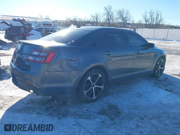 2015 Ford Taurus Limited with VIN 1FAHP2J85FG165823, listed as a IAAI auction lot 41315889 with 134,165 mi miles. Bid and sale history available at carsss.com. Image 4.