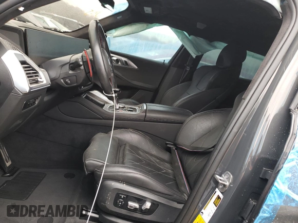 2023 BMW XM z VIN 5YM23CS03P9S57455, wystawiony jako Copart lot #87658815 z przebiegiem Nie podano mil oraz Szkoda całkowita • Salvage title. Historia ofert i sprzedaży dostępna na DreamBid. Obrazek 7.