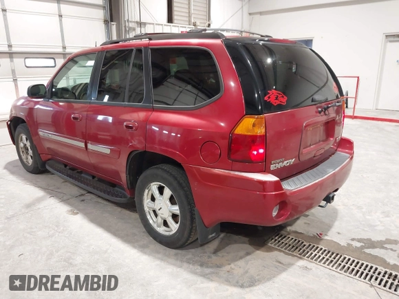 2005 GMC Envoy SLT with VIN 1GKDT13S352324863, listed as a IAAI auction lot 41707649 with 247,326 mi miles. Bid and sale history available at carsss.com. Image 3.