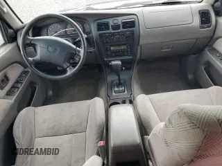 2002 Toyota 4Runner SR5 z VIN JT3GN86R220227055, wystawiony jako Copart lot #59354055 z przebiegiem 306 121 mil mil oraz Czysty tytuł • Clean title. Historia ofert i sprzedaży dostępna na DreamBid. Obrazek 8.
