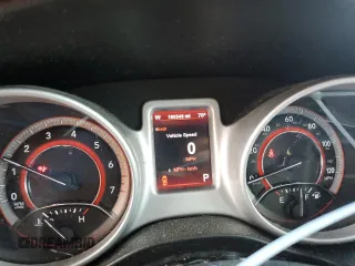 2012 Dodge Journey SXT with VIN 3C4PDCBG5CT135724, listed as a Copart auction lot 56938415 with 180,548 mi miles and Salvage title. Bid and sale history available at DreamBid. Image 9.