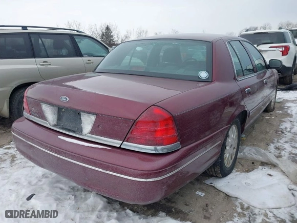 2004 Ford Crown Victoria LX with VIN 2FAFP74W14X128791, listed as a IAAI auction lot 41405101 with 137,091 mi miles. Bid and sale history available at carsss.com. Image 4.