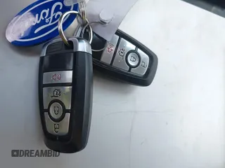 2022 Ford Escape SE z VIN 1FMCU0G66NUB82519, wystawiony jako IAAI lot #42444455 z przebiegiem 102 980 mil mil oraz . Historia ofert i sprzedaży dostępna na DreamBid. Obrazek 11.