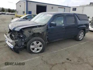 2010 Honda Ridgeline RTL with VIN 5FPYK1F50AB005120, listed as a Copart auction lot 53569115 with 173,878 mi miles and Salvage Title. Bid and sale history available at carsss.com. Image 1.