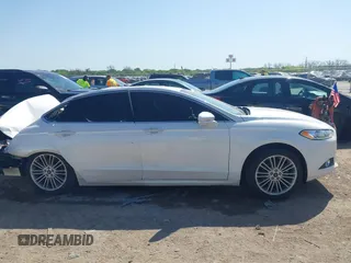 2016 Ford Fusion SE with VIN 3FA6P0T97GR239612, listed as a IAAI auction lot 42009642 with 156,659 mi miles and . Bid and sale history available at DreamBid. Image 13.