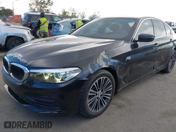 2019 BMW 5 Series 530i with VIN WBAJA5C54KWW45379, listed as a IAAI auction lot 41276092 with 77,025 mi miles. Bid and sale history available at carsss.com. Image 2.
