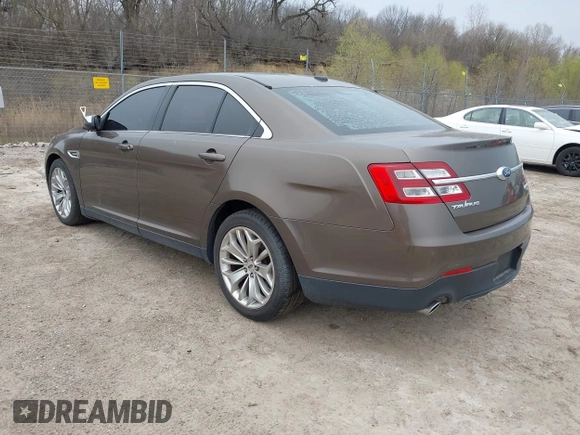 2015 Ford Taurus Limited with VIN 1FAHP2J84FG110702, listed as a IAAI auction lot 42060437 with 208,012 mi miles. Bid and sale history available at carsss.com. Image 3.