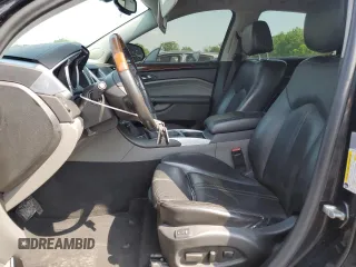 2011 Cadillac SRX Premium Collection z VIN 3GYFNFEY9BS606335, wystawiony jako Copart lot #59009285 z przebiegiem 152 828 mil mil oraz Szkoda całkowita • Salvage title. Historia ofert i sprzedaży dostępna na DreamBid. Obrazek 7.