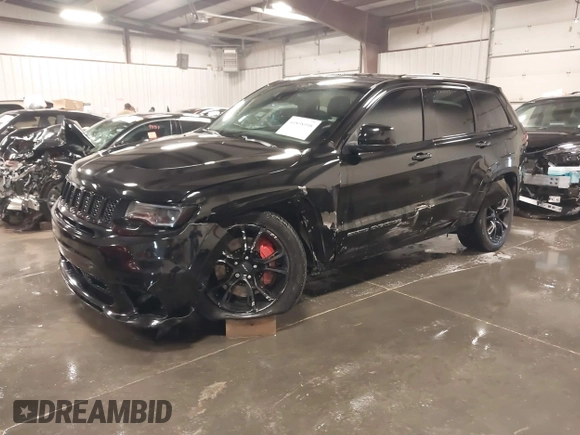 2017 Jeep Grand Cherokee SRT with VIN 1C4RJFDJ9HC739324, listed as a IAAI auction lot 40898998 with 92,547 mi miles. Bid and sale history available at carsss.com. Image 17.