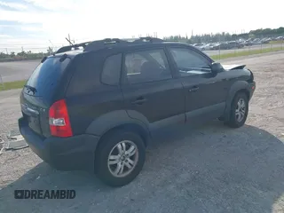 2007 Hyundai Tucson SE with VIN KM8JN12DX7U573823, listed as a IAAI auction lot 41238550 with 79,641 mi miles. Bid and sale history available at carsss.com. Image 4.