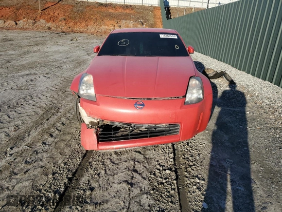 2004 Nissan 350Z Touring with VIN JN1AZ34E84T051139, listed as a Copart auction lot 74269504 with 148,272 mi miles and Salvage Title. Bid and sale history available at carsss.com. Image 5.