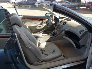 2005 Mercedes-Benz SL 500 with VIN WDBSK75F95F106944, listed as a IAAI auction lot 41970698 with 123,881 mi miles and . Bid and sale history available at DreamBid. Image 5.