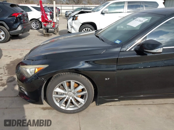 2015 Infiniti Q50 z VIN JN1BV7AP3FM335871, wystawiony jako IAAI lot #41472424 z przebiegiem 127 383 mil mil oraz . Historia ofert i sprzedaży dostępna na DreamBid. Obrazek 17.