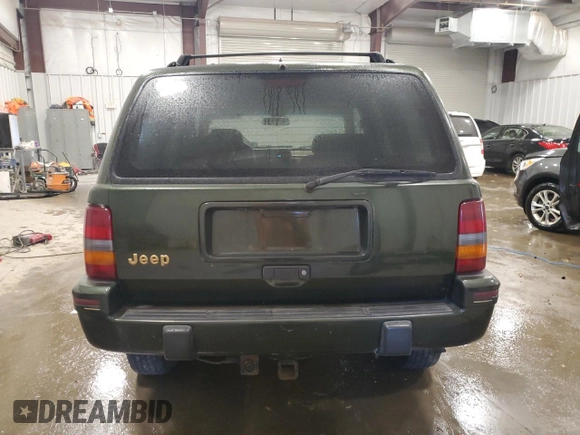 1995 Jeep Grand Cherokee Limited with VIN 1J4GZ78S9SC547492, listed as a Copart auction lot 83001084 with 109,863 mi miles and Clean title. Bid and sale history available at DreamBid. Image 6.