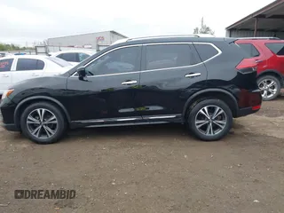 2017 Nissan Rogue S with VIN JN8AT2MV6HW000403, listed as a IAAI auction lot 41906764 with 117,975 mi miles and . Bid and sale history available at DreamBid. Image 14.