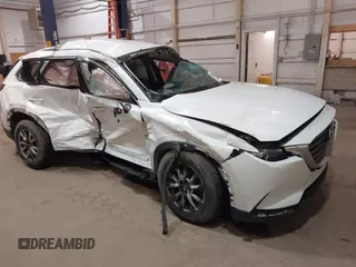2016 Mazda CX-9 Touring with VIN JM3TCBCY3G0114707, listed as a IAAI auction lot 42023034 with 225,281 mi miles and . Bid and sale history available at DreamBid. Image 1.