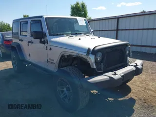 2012 Jeep Wrangler Unlimited Sport z VIN 1C4BJWDG5CL224674, wystawiony jako IAAI lot #42401437 z przebiegiem 166 576 mil mil oraz . Historia ofert i sprzedaży dostępna na DreamBid. Obrazek 1.