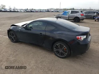 2014 Scion FR-S z VIN JF1ZNAA19E9709220, wystawiony jako Copart lot #54389725 z przebiegiem 123 443 mil mil oraz Szkoda całkowita • Salvage title. Historia ofert i sprzedaży dostępna na DreamBid. Obrazek 2.