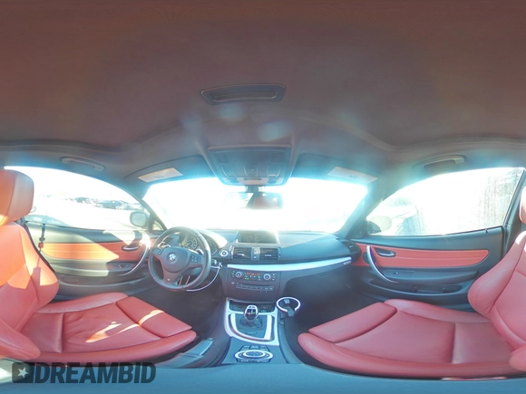 2013 BMW 1 Series 135i with VIN WBAUC9C54DVM13873, listed as a Copart auction lot 82657734 with 78,021 mi miles and Salvage title. Bid and sale history available at DreamBid. Image 12.