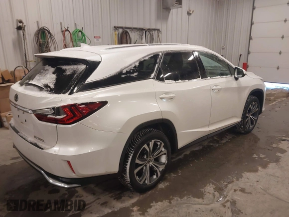 2018 Lexus RX 350L Premium with VIN JTJDZKCA7J2011085, listed as a IAAI auction lot 41332358 with 86,548 mi miles and . Bid and sale history available at DreamBid. Image 4.