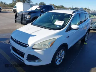 2013 Ford Escape SE with VIN 1FMCU0G9XDUD01410, listed as a IAAI auction lot 41758032 with 154,208 mi miles. Bid and sale history available at carsss.com. Image 17.