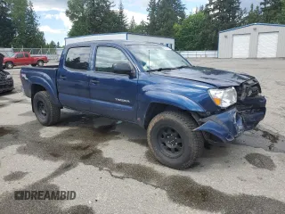 2007 Toyota Tacoma z VIN 5TELU42N67Z400950, wystawiony jako Copart lot #56432815 z przebiegiem 59 207 mil mil oraz Szkoda całkowita • Salvage title. Historia ofert i sprzedaży dostępna na DreamBid. Obrazek 4.