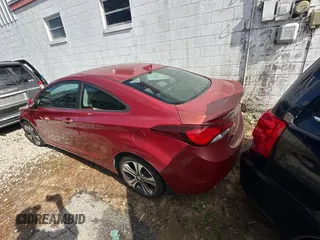 2014 Hyundai Elantra Coupe with VIN KMHDH6AH9EU025573, listed as a Copart auction lot 87049884 with 103,713 mi miles and Clean Title. Bid and sale history available at carsss.com. Image 3.